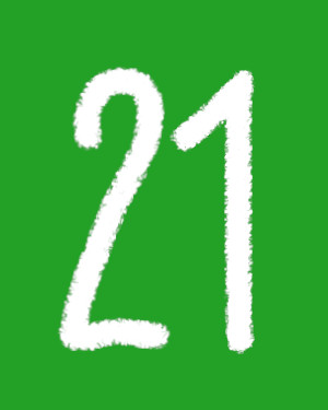 Weiße Kreideeinundzwanzig auf Grasgrün