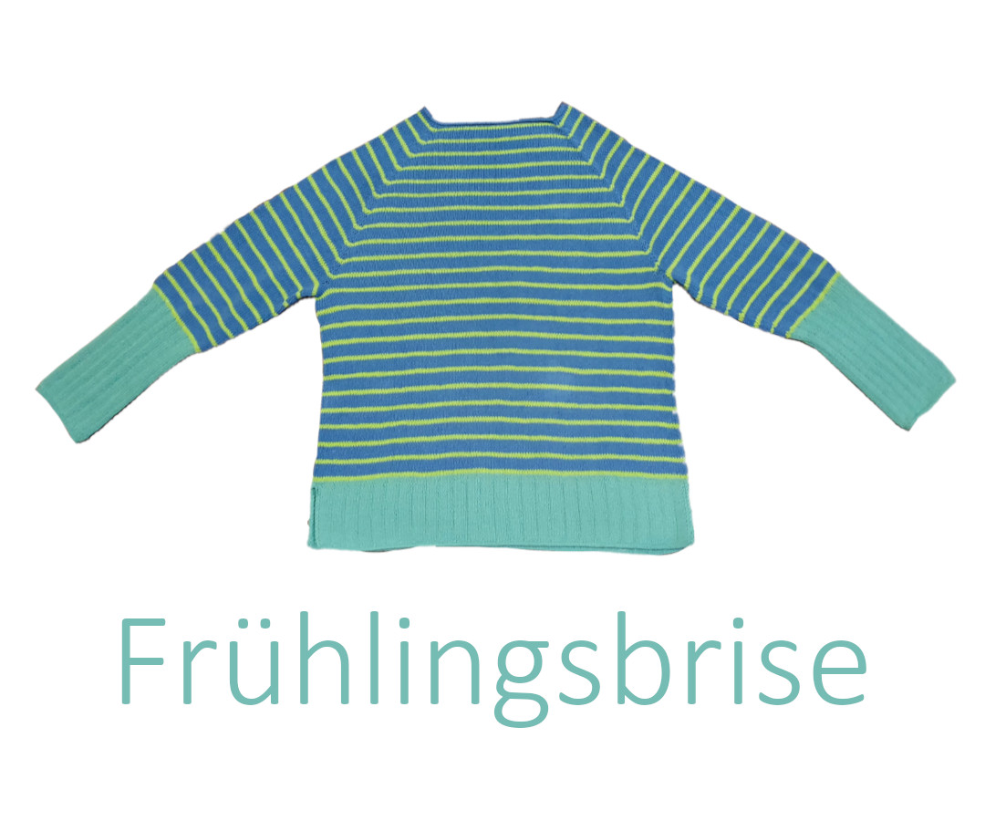Aufsicht auf getreiften Pullover mit Blockbündchen in Kontrastfarben mit Untertitel Frühlingsbrise