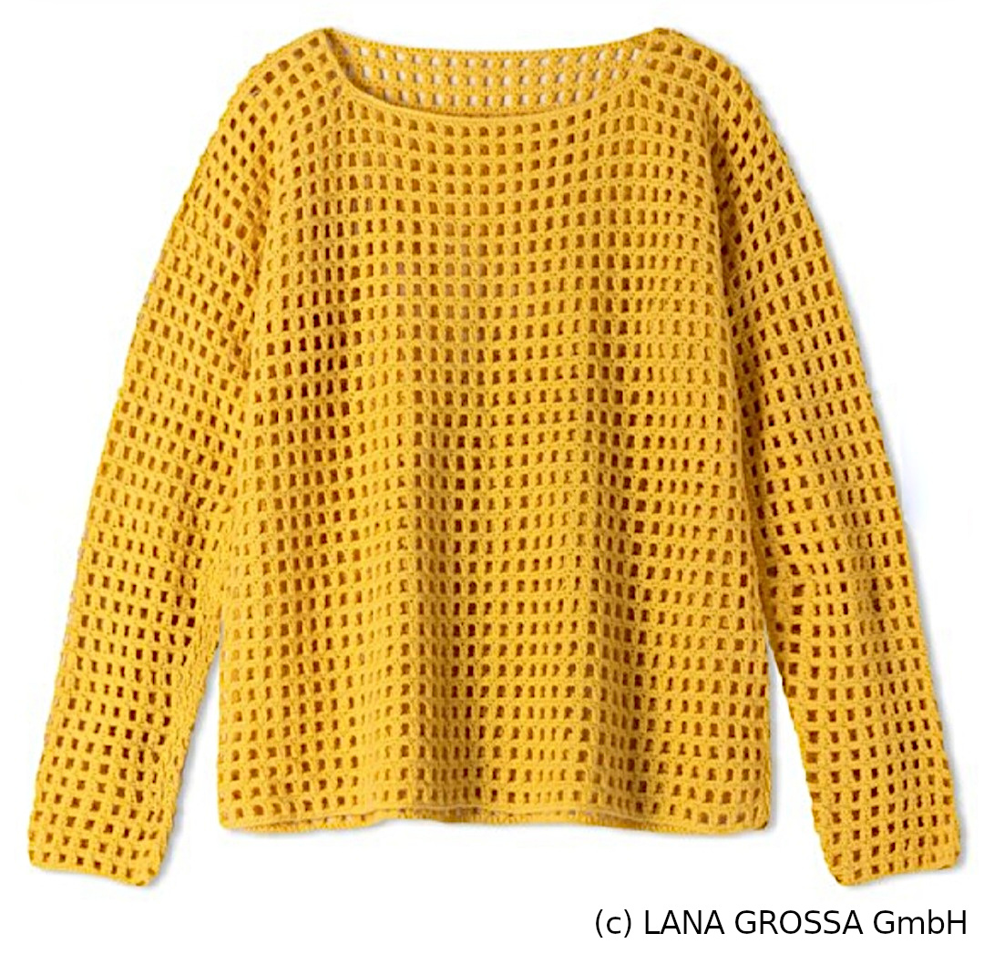 Aufsicht auf gelben Häkelpullover